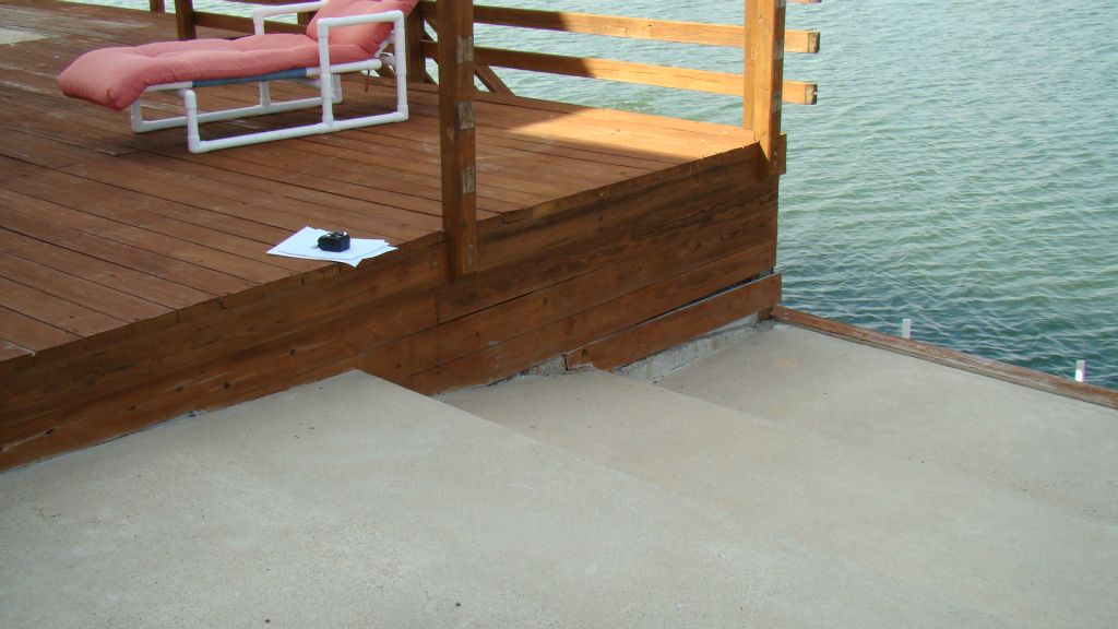 EXISTING WOOD DECK, CONCRETE STEPS and FLATWORK, HANDRAILS, BULKHEAD, STAIRS and POOL to be REPLACED